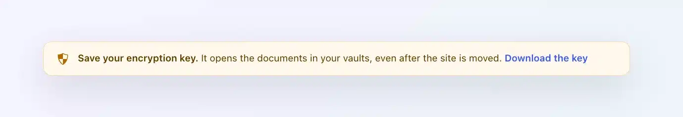 Client Vault message “Save your encryption key.” with the Download the key link